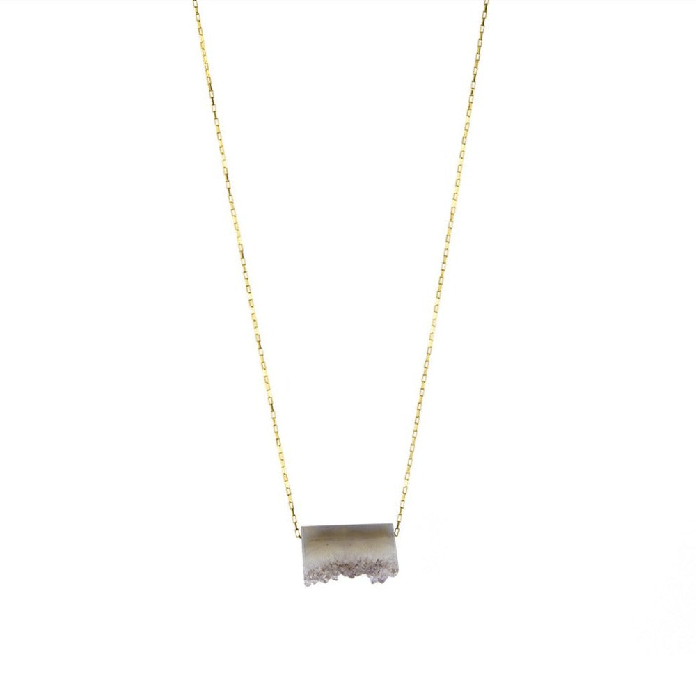 Zurina Ketola Designs Long Necklace featuring a one of a kind amethyst druzy slice pendant on 14K gold fill drawn cable chain on white background