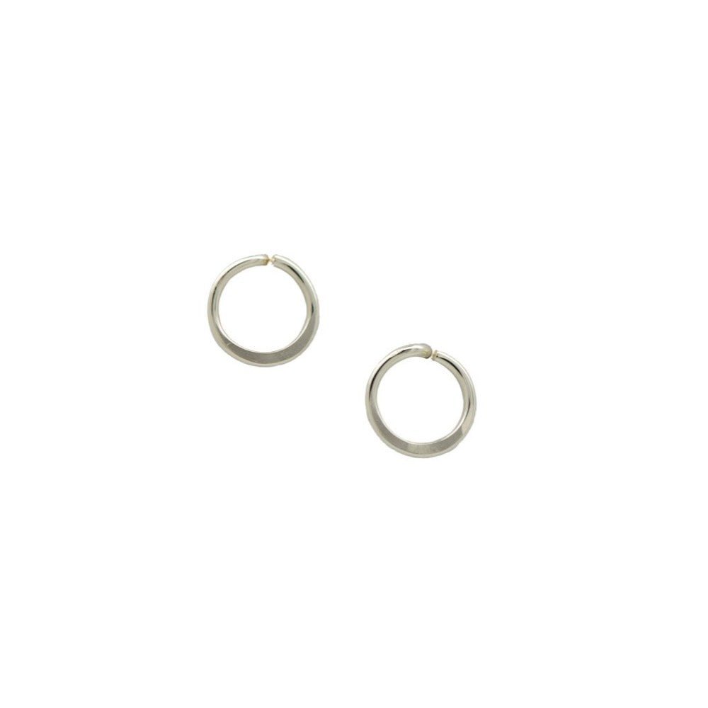 Zurina Ketola handmade circle post earrings in sterling silver on white background. Made from recycled silver. Eco Silver Circle Post Earrings.