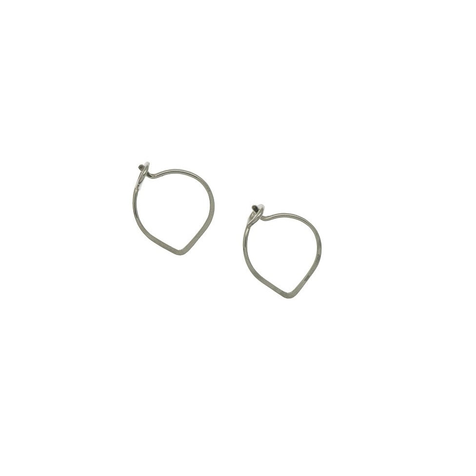 Zurina Ketola Designs handcrafted jewelry featuring handmade hoop earrings. Sleek and sophisticated, these sparkling petite lotus hoop earrings are sterling silver.