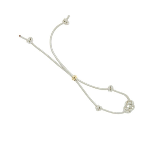 Zurina Ketola Designs adjustable leather prosperity bracelet with gold detail on white background