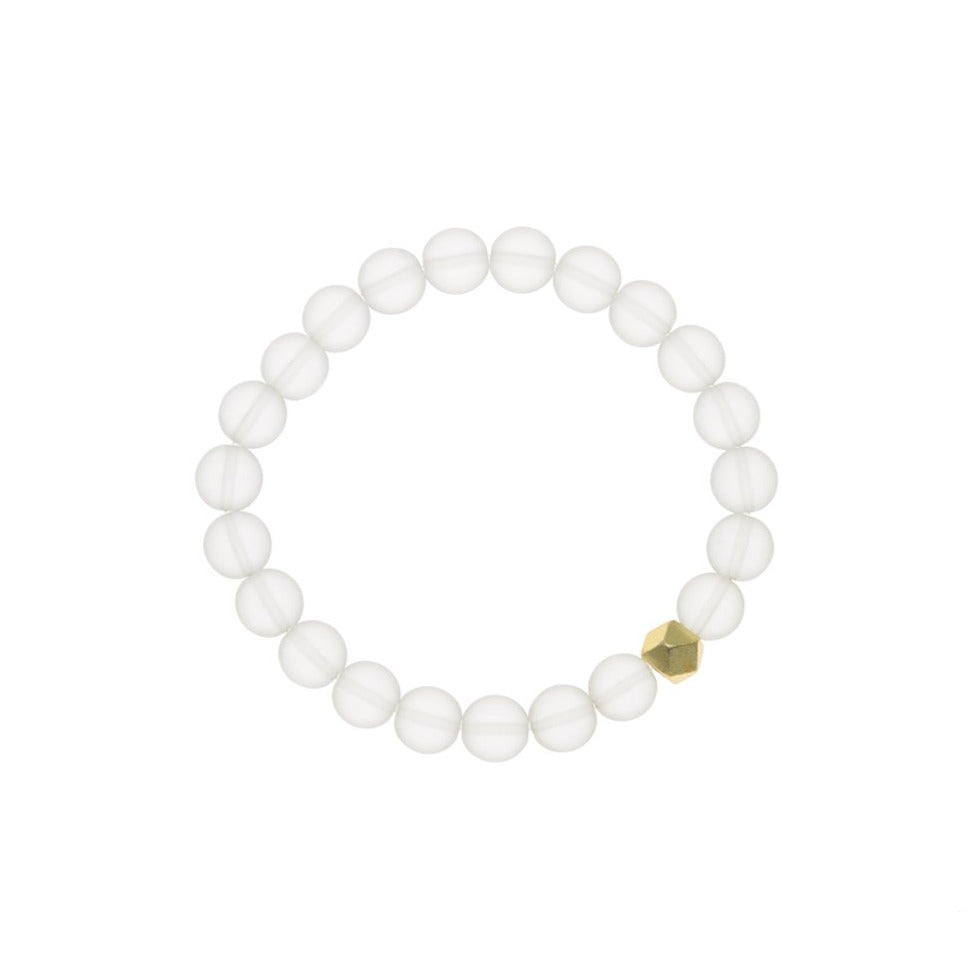 Zurina Ketola stretch mala inspired bracelet featuring matte crystal and gold plated geometric copper detail