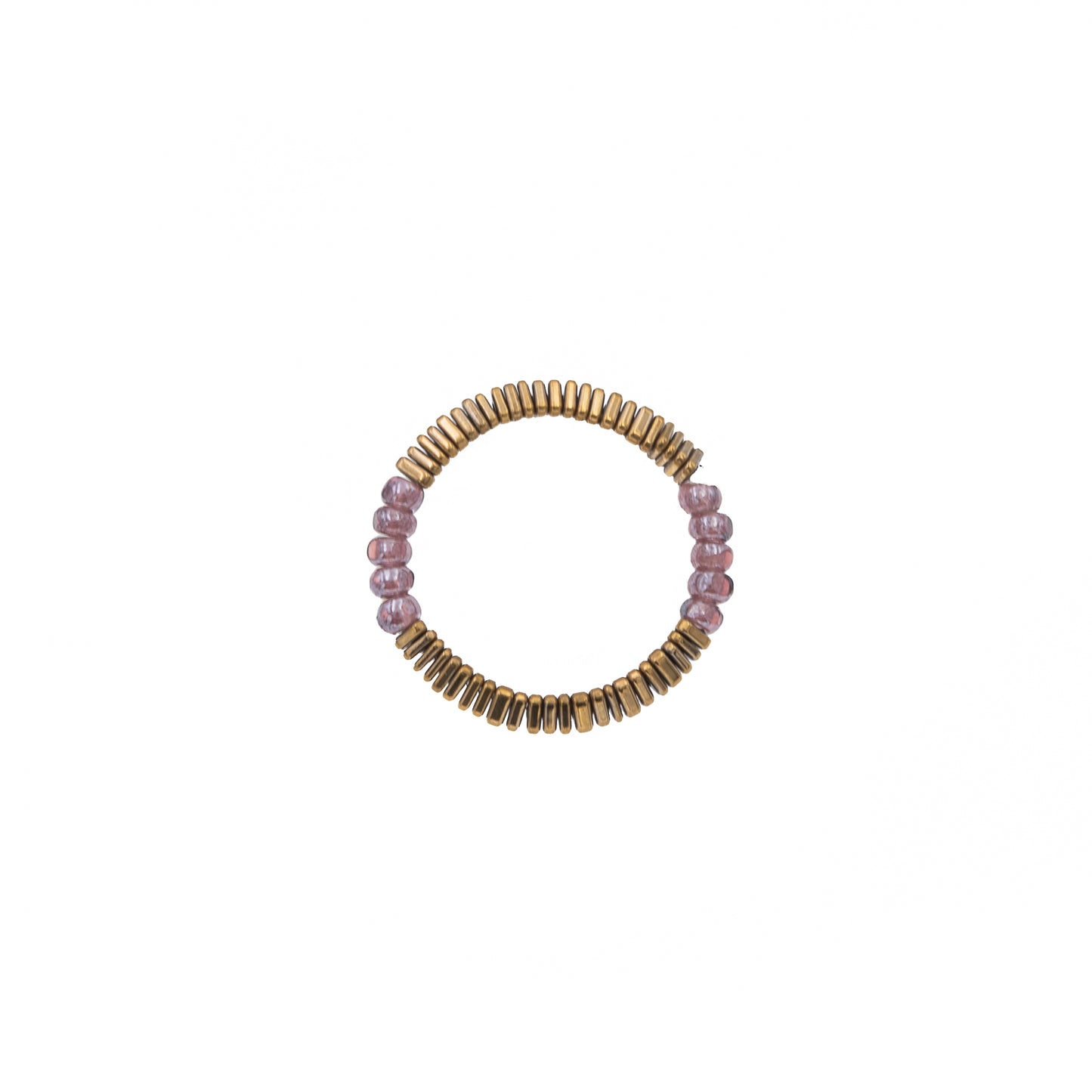 Zurina Ketola Beaded Stretch Ring with Purple Seed Beads and Gold Tiny Triangle Hematite Details on White Background. 