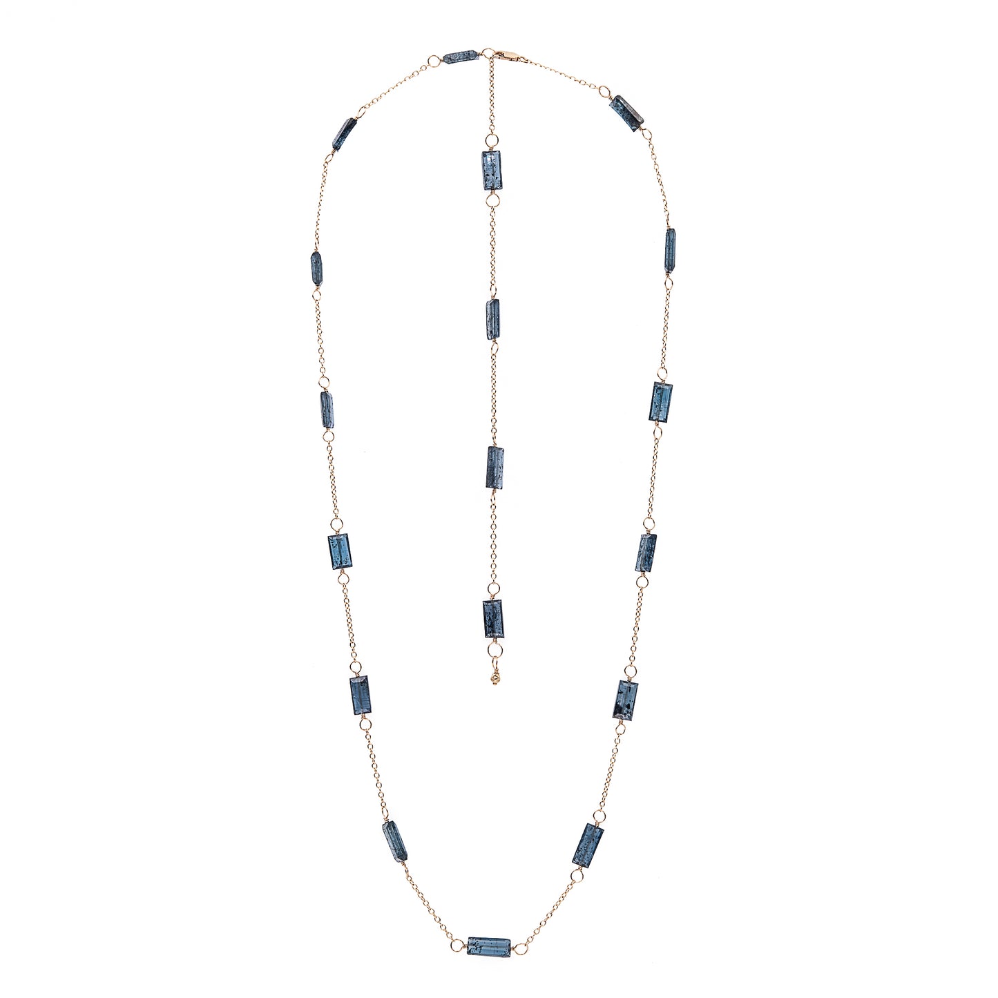Zurina Ketola long moss aquamarine necklace in 14K gold fill shown as a shorter length with long chain and gemstone detail at clasp on white background.