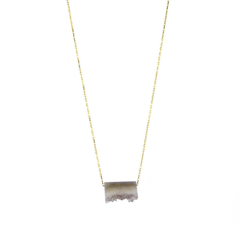 Zurina Ketola Designs Long Necklace featuring a one of a kind amethyst druzy slice pendant on 14K gold fill drawn cable chain on white background