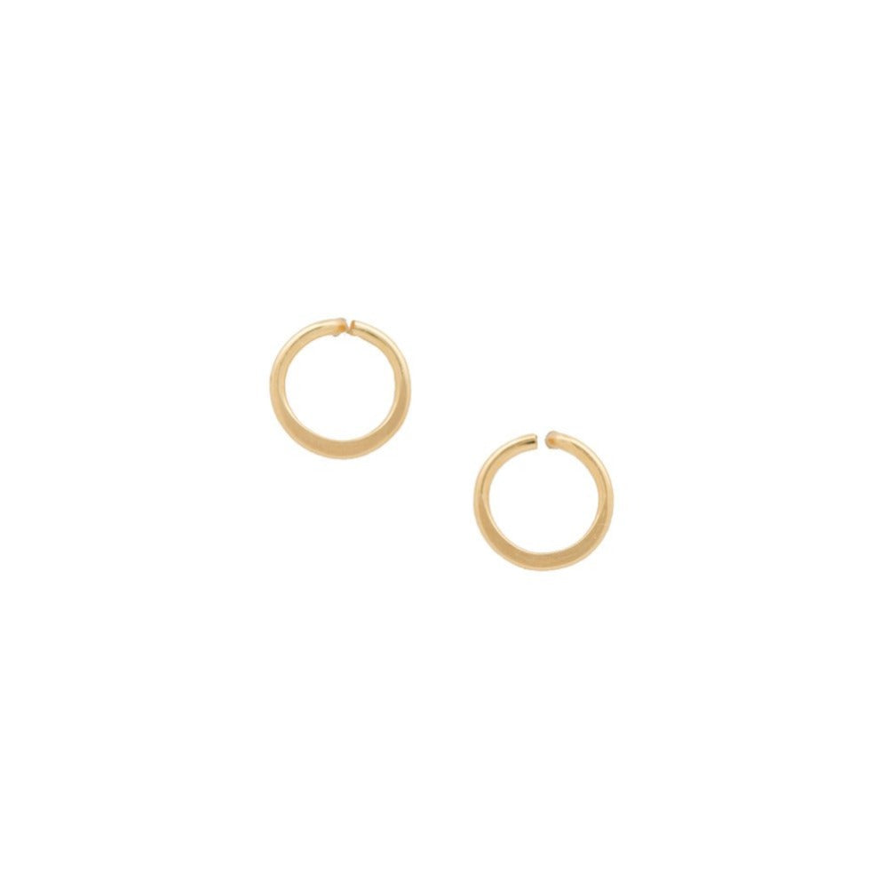 Zurina Ketola handmade circle post earrings in 14K gold fill on white background. Made from ethically sourced gold.