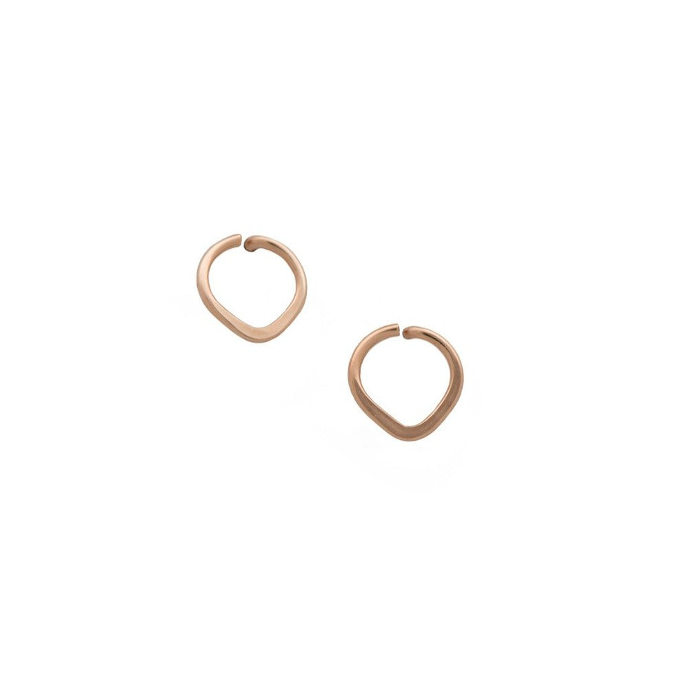 Zurina Ketola Designs lotus post earrings in rose gold on white background