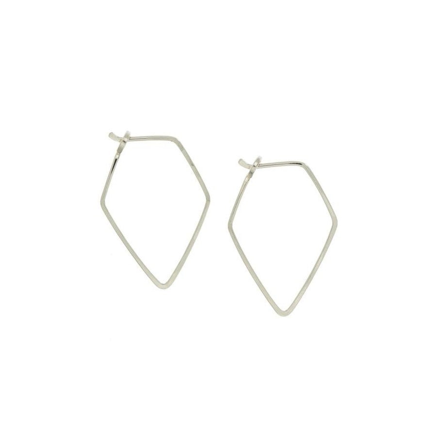 Zurina Ketola Designs handcrafted jewelry featuring handmade hoop earrings. Modern and minimal, these sleek diamond hoop earrings are made from recycled sterling silver. 