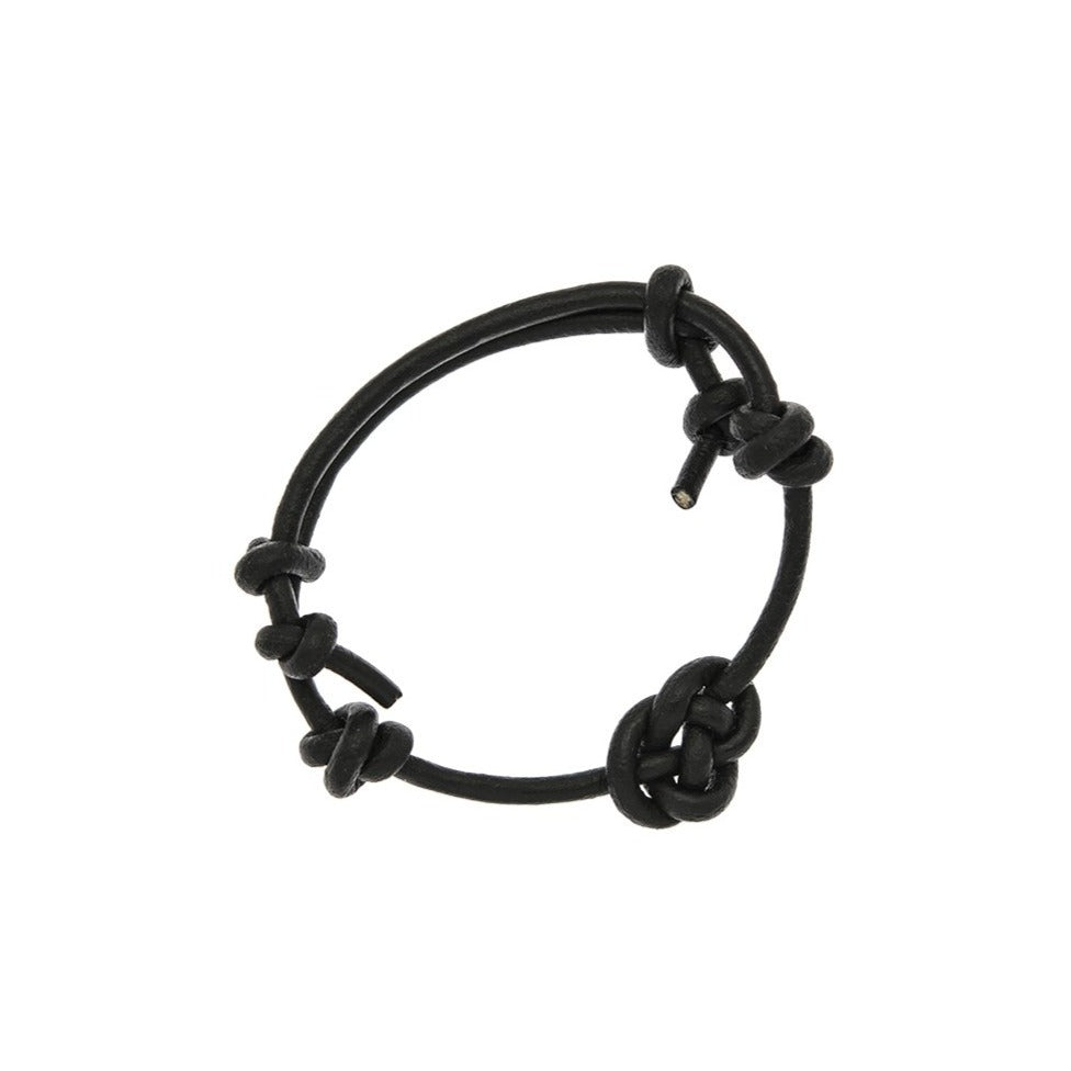 Zurina Ketola adjustable natural black leather mondo prosperity bracelet on white background
