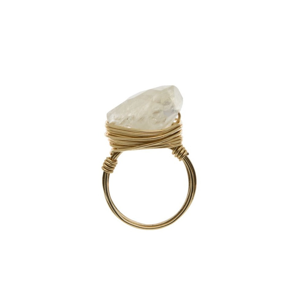 Zurina Ketola  rainbow moonstone ring in 14K gold fill on white background. Side iew.