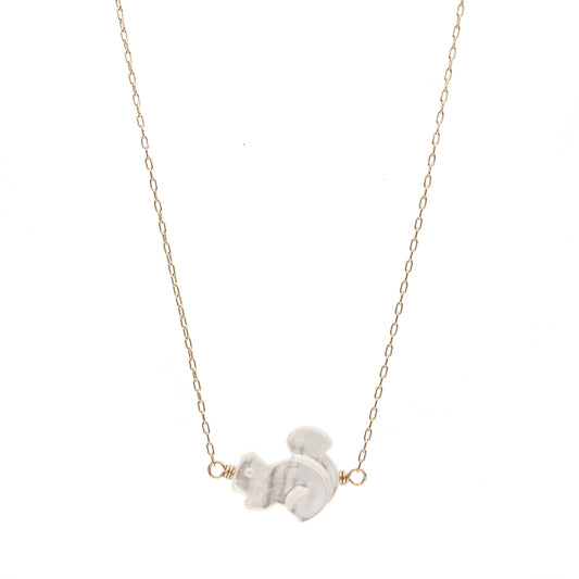 Zurina Ketola Designs carved mother of pearl squirrel necklace in 14K gold fill.